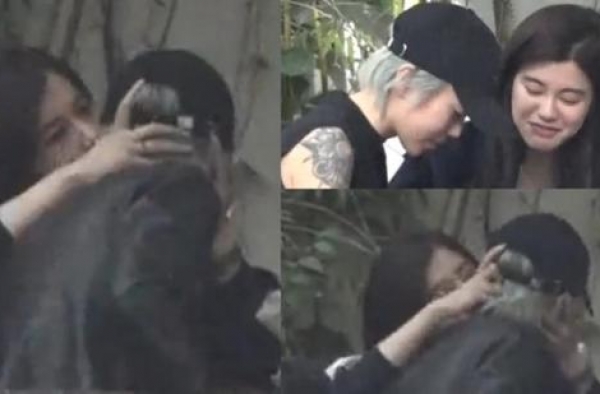 窦靖童亲吻女友人 回应：在说悄悄话