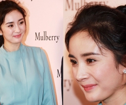 杨幂减龄高马尾再现少女幂 甩袖衬衫知性大方