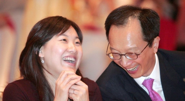 伏明霞与梁锦松离婚，二人做出不同回应