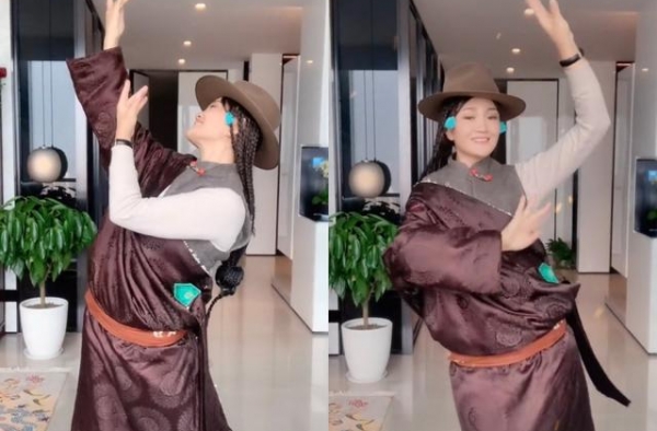 降央卓玛穿袍子很朴素，身后豪宅抢眼！怀三胎时挺9月孕肚唱高音